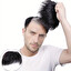 She bought a (toupe-), or (hairpie-e) to po angielsku
